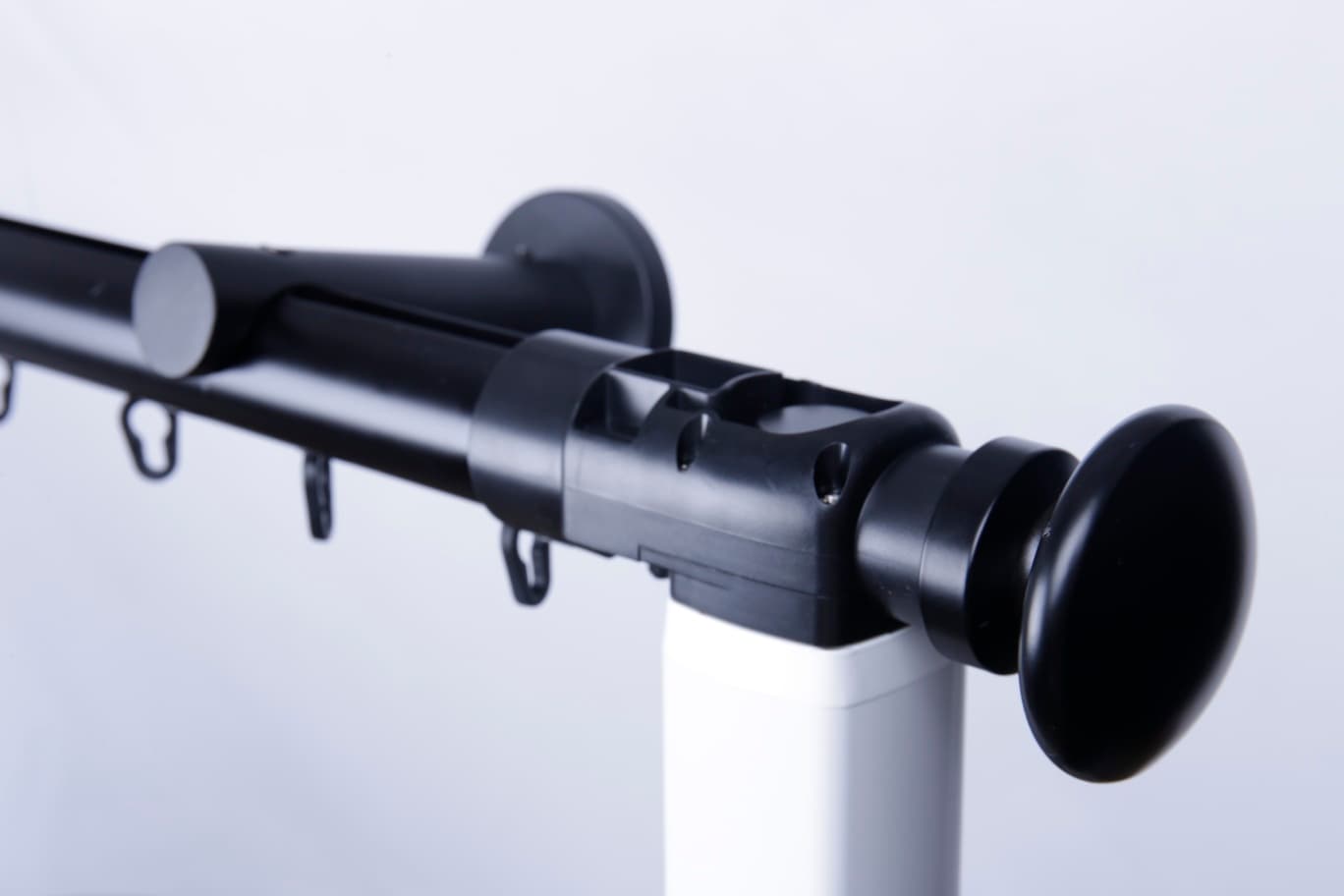 Motorized drapery track — black finish